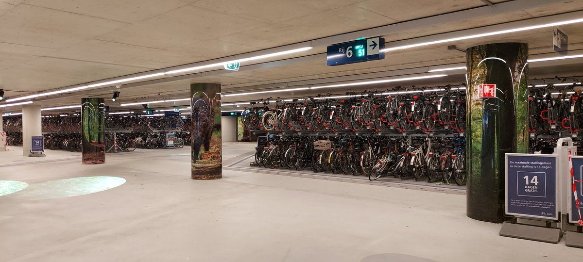 CharlotteHase's tweet image. Starting out to #SIGIR2022. First stop:  🚲 parking garage at Delft station. Making it to Schiphol with four hours to spare.