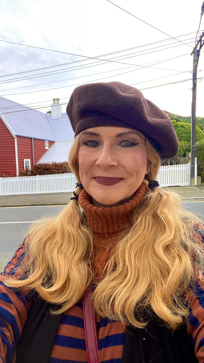 KatZolitaMason's tweet photo. On my walk today in coldest wintry Wellington in front of the white picket fences. What on earth is she doing with all that hair? - At least it keeps me warm (and smiling) #haireverywhere #wellington #hike #walk #winter #singersongwriter #walkforhealth #rambler #naturewalker https://t.co/53n3CT13h5