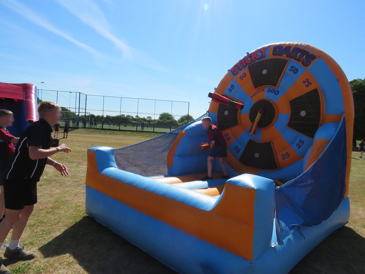 Manor_School's tweet photo. Students who achieved their Gold, Platinum or School Colours awards this academic year attended #REACHFest today, where they could play carnival games and enjoy inflatable amusements out on the field. Last year's winners also attended as their previous event had to be cancelled. https://t.co/mWQwXyMB6x