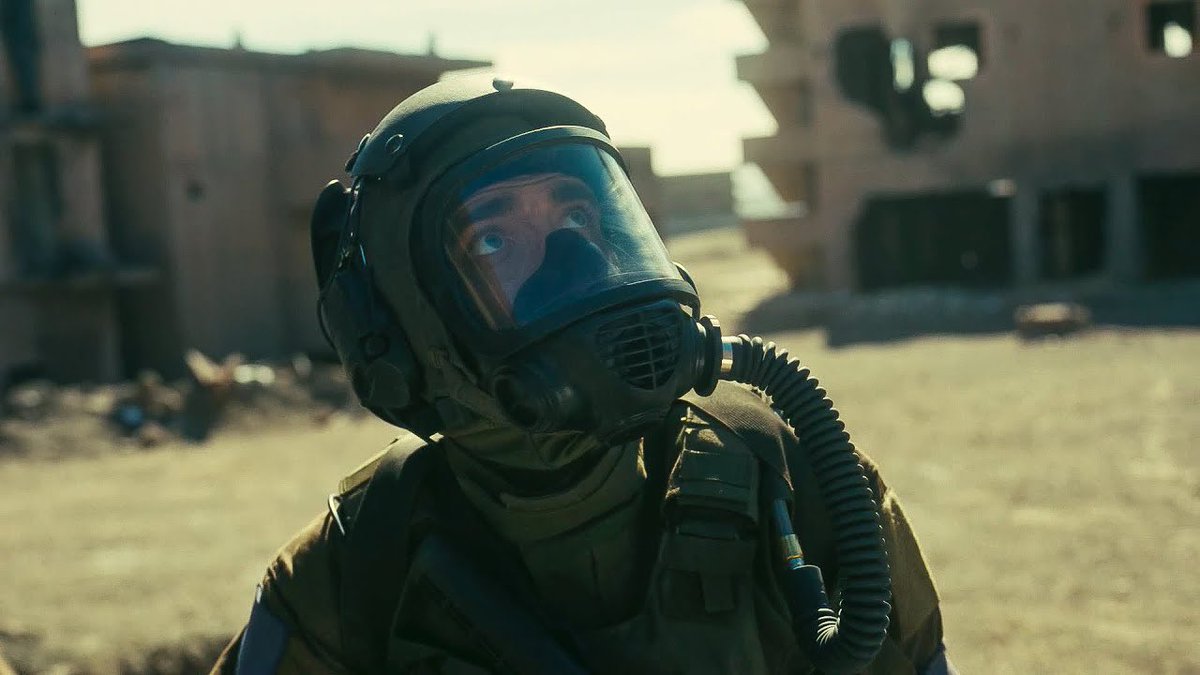 Man Wearing MIRA Safety's CM-6M from the movie TENET 2020