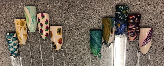 EasternCenter's tweet photo. It's spa week in Cosmetology! Check out some of these amazing nail designs. Great job to all! #skills #cosmetology #spaweek #nailart https://t.co/DA8EZvTTXE
