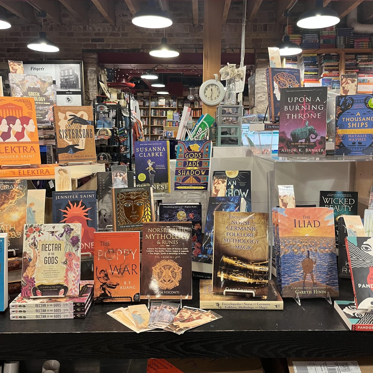 FitgersBooks's tweet photo. A table full of mythology, what more could you ask for? This month, we are featuring a variety of stories containing mythology, folktales, and reimaginings of classic gods and goddesses. 

#FeatureTable #ShopLocal #Mythology https://t.co/Vq8eKUSSjA