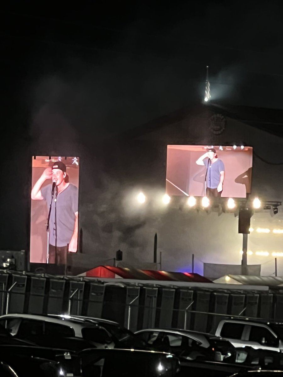 hollybug25's tweet photo. When you’ve waited to see @MorganWallen for 2 years at Country Concert @countryconcert and feel horrible the day of the concert, but you were in a parking area where you could see the big screens and still hear it. 😞😞She was such a trooper. https://t.co/HVUWgd1jB9