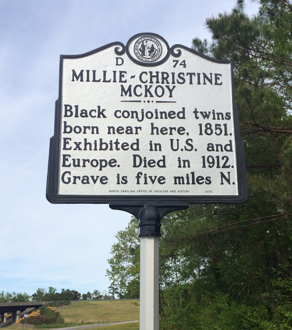 NC_Markers's tweet photo. #OnThisDay in 1851, Millie-Christine McKoy, conjoined twins, were born into slavery in Columbus Co. Known as as the “Carolina Nightingale,” they traveled the world, learned several languages, and met Queen Victoria, who gave them matching brooches. https://t.co/dQKWY8hoe8 https://t.co/llY4jfekRI