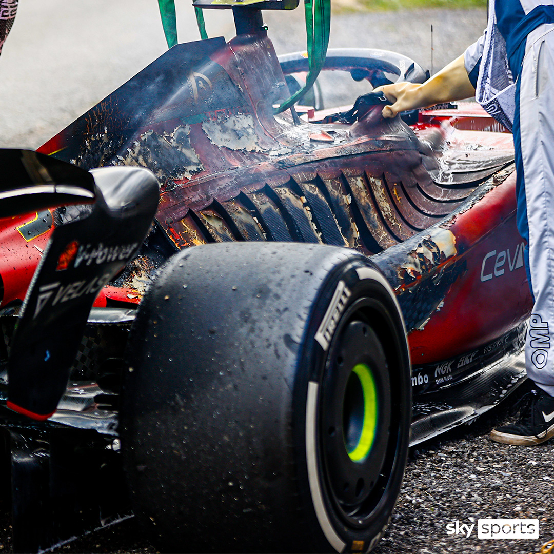SkySportsF1's tweet photo. Carlos Sainz's burnt out F1-75 😲🧯🔥 https://t.co/a3rZbhEPQW