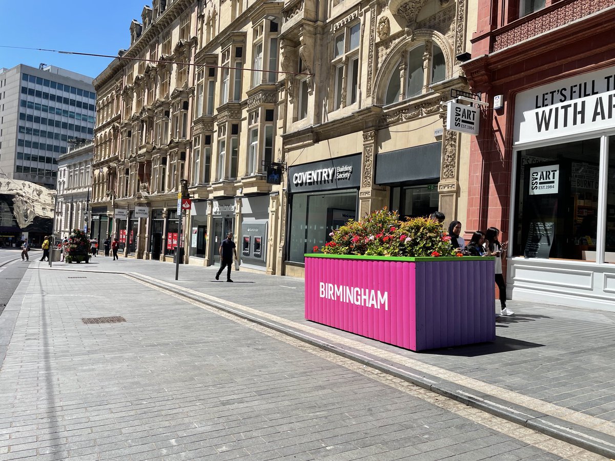 The BID team have refurbed the old planters and they’ve just come out today ready for the games.