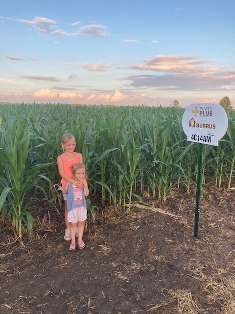 Hannah and Kate are proud of their dad, #BurrusSeed Account Manager, Kaleb's corn plot in Sullivan Co., MO! #grow22 #AlwaysGrowing