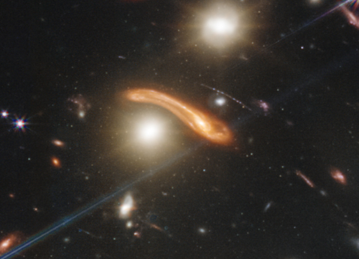 coreyspowell's tweet photo. "Warped space" sounds like a very abstract concept -- but you can really SEE it in the new JWST image. This is what gravity does to the light of a distant galaxy: https://t.co/HAnecuqkQ9
