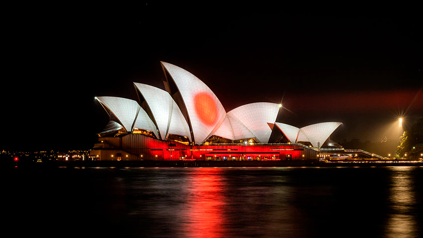 sydney opera house lights up in solidarity w/ japan