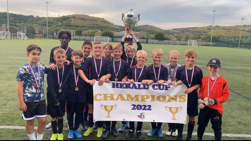 Huge congratulations to the St Nicholas Football team 2022 Herald Cup winners. 🎉.               This season they have played with pride and determination - living our values on the pitch. True sports people of the future. ❤️💙
#NewRomney #HeraldCup