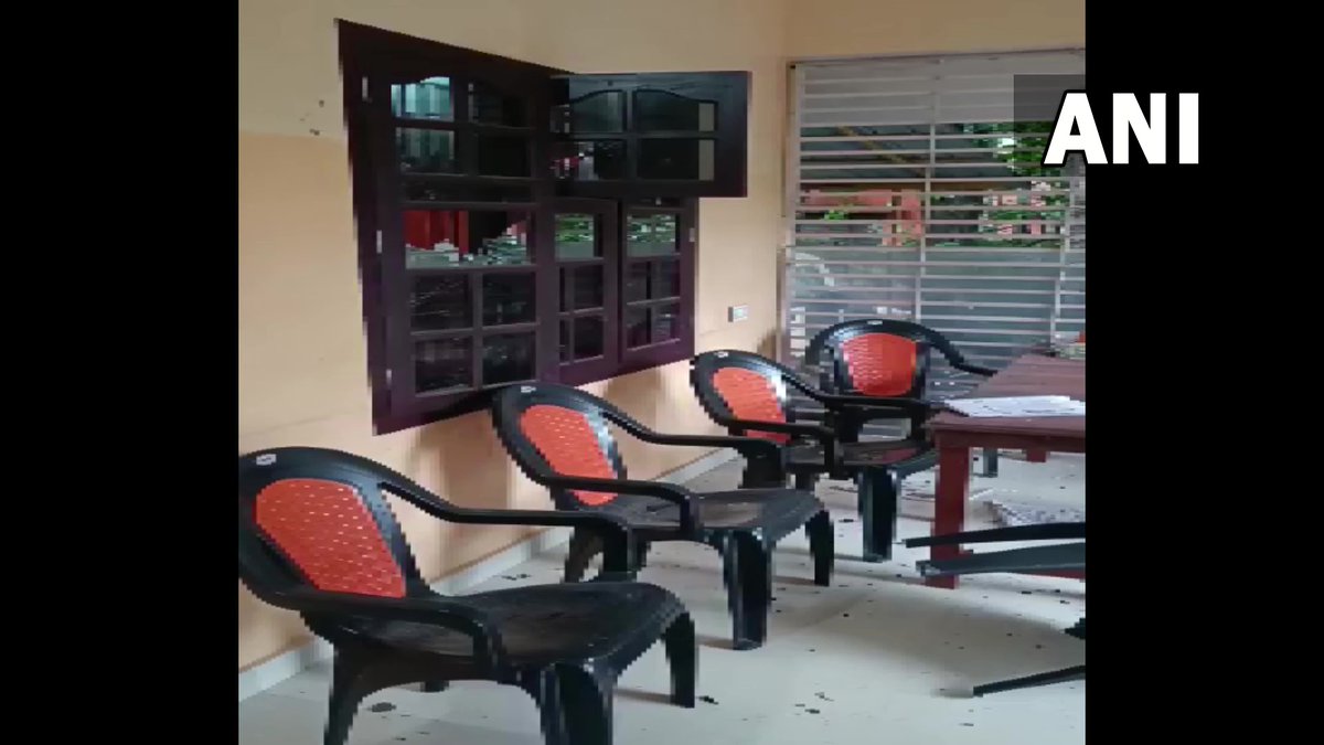 ANI's tweet photo. Kerala | Visuals from RSS office in Payyannur, Kannur which was allegedly bombed early this morning, leaving the window glass broken https://t.co/ALjpuXNH2K