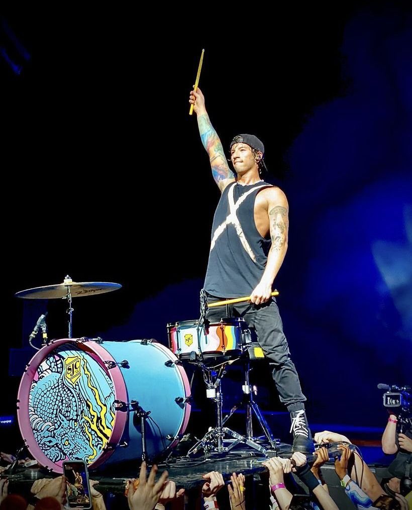 softestbandito's tweet photo. something i will never get over is josh dun holding the drums for trees at a tøp show in 2010 and now he is the one being held up by everyone whilst he plays the drums in that very same band 🥺 https://t.co/WFODfg1zQP