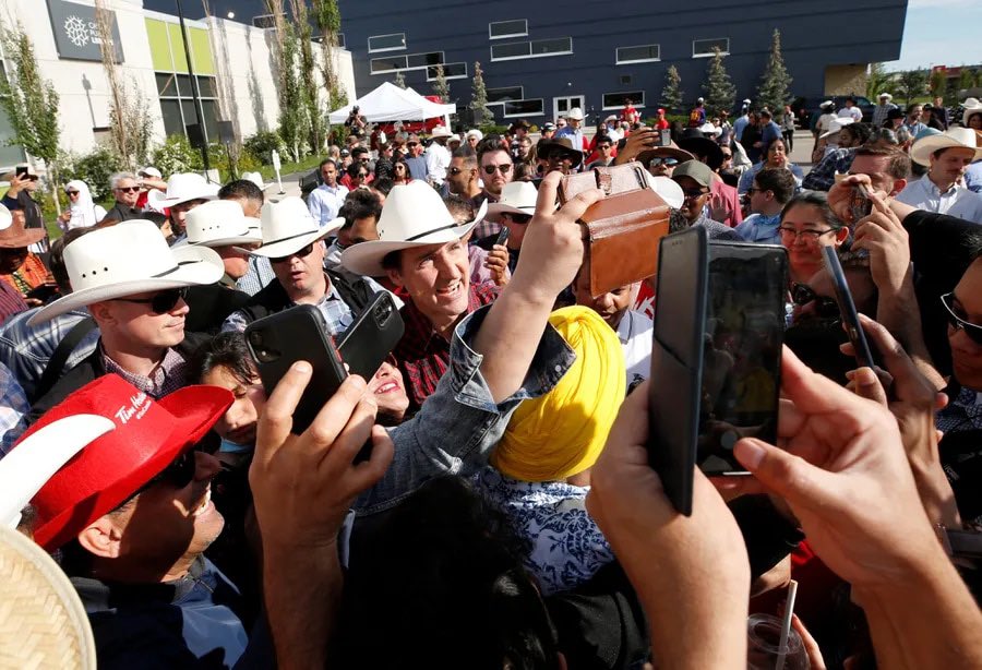 its_Graham_'s tweet photo. LOL 😂😂😂 Dipshit Trudeau and his asshat “mob of admirers” at the stampede, was actually in the Calgary Public Library parking lot 17km away from the event! https://t.co/uvs8CvZgnZ