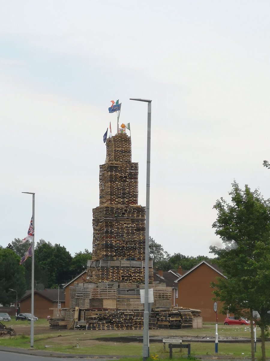 GerryCu58302876's tweet photo. How can you in loyalist culture ask me to respect your tradition when you take the flag of my county, the poster of my MLA , the flag of my religion, and a KAT message, put them on a bonfire lit with £1000s worth of gov sponsored pallets and tell me that I am the problem. https://t.co/hEj1KbPz5X