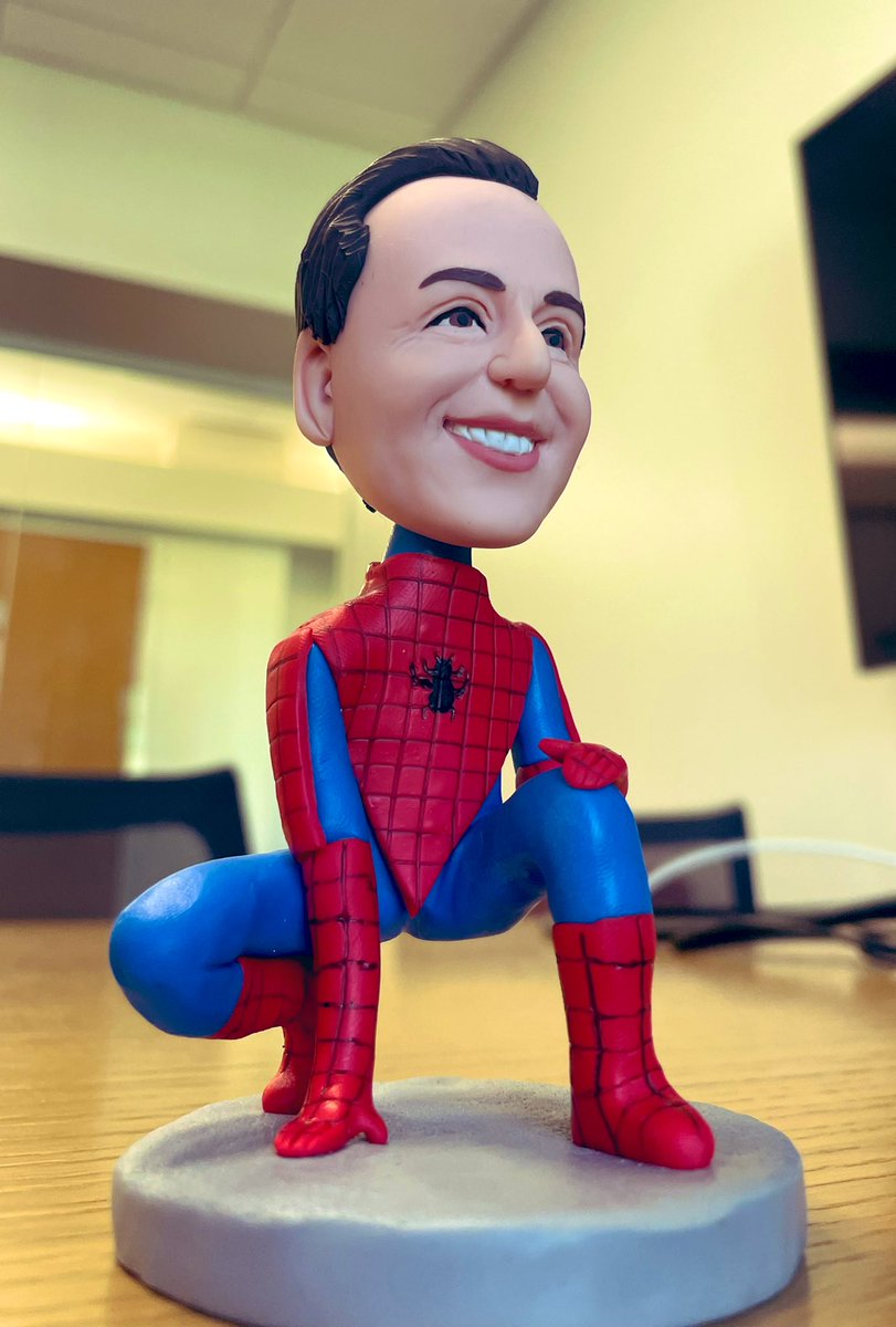 A custom bobblehead toy with my face and Spider-Man’s body.