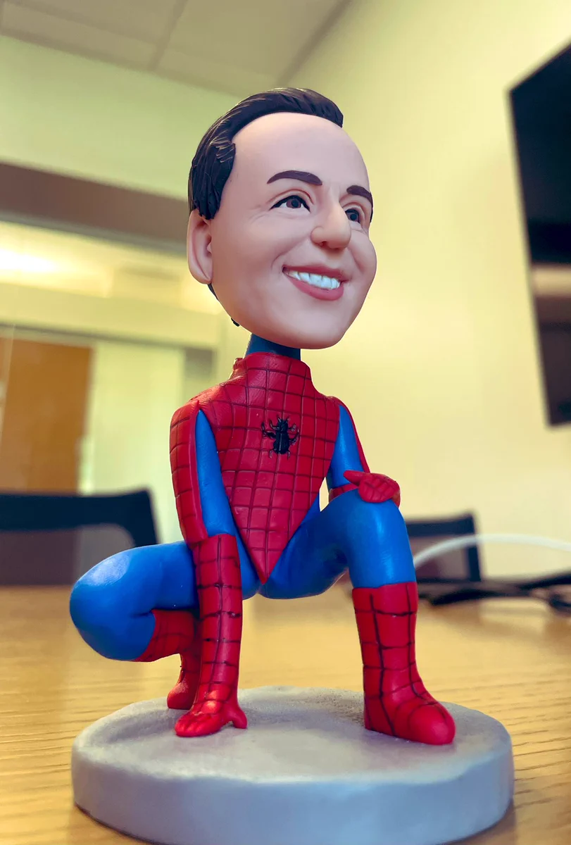 A custom bobblehead toy with my face and Spider-Man’s body.