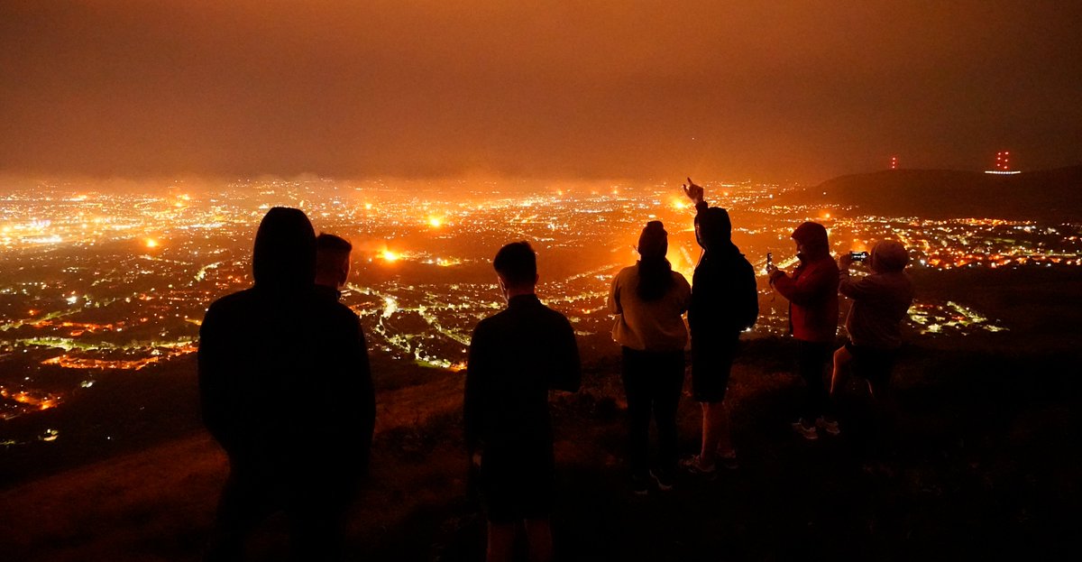 niallcarsonpa's tweet photo. The First time I've ever walked up Cave Hill never mind in the dark. But the view of Belfast's #11thnight  #Bonfires from Napoleons Nose is quite something. https://t.co/BDWcXMLCSi