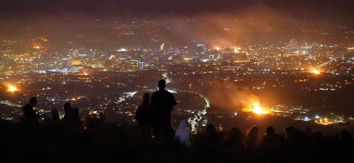 niallcarsonpa's tweet photo. The First time I've ever walked up Cave Hill never mind in the dark. But the view of Belfast's #11thnight  #Bonfires from Napoleons Nose is quite something. https://t.co/BDWcXMLCSi