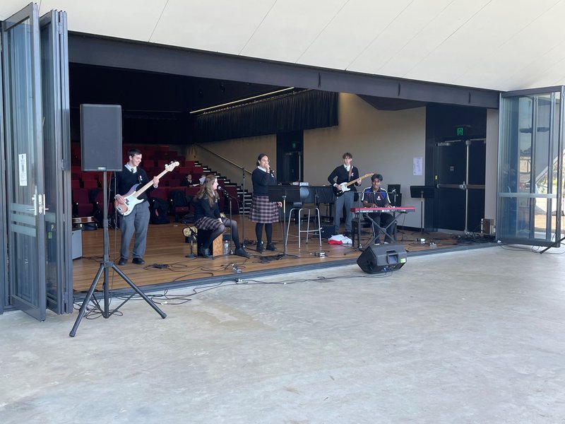 PACpenrith's tweet photo. The Tiered Learning Centre was flipped around, and Year 11 students performed to students and staff on the oval during lunch time.

Students are working through the topic “Music for Small Ensembles” and performed covers of existing songs in a different style.
#penrith #music https://t.co/33xEGAe5LA