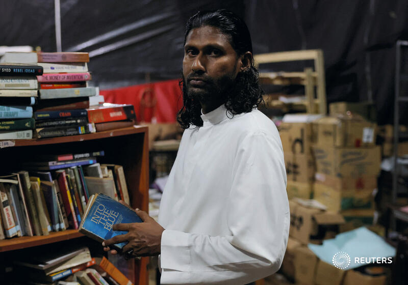 "There were so many elderly, teenagers, youth, women," said Jeevanth Peiris, a Catholic priest who is part of the activist group.

He said was involved in the clashes with police, as protesters stormed the buildings.

"People didn't want to give up, didn't want to withdraw."