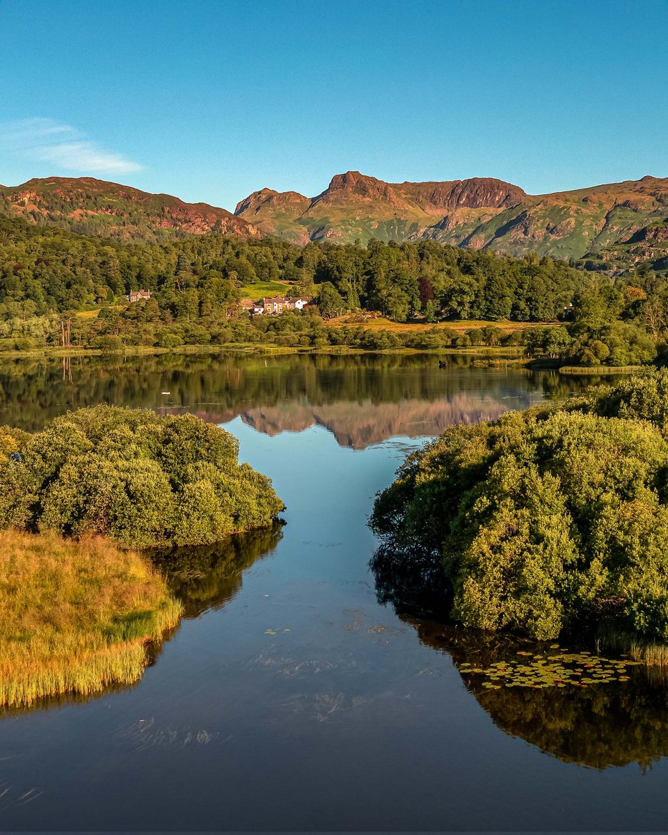 Morning everyone hope you are well. Yesterday's reflections over Elterwater towards the Langdales. Have a great day. #LakeDistrict <a href="/FeatureCumbria/">@featurecumbria</a> <a href="/keswickbootco/">Keswick boot co</a>