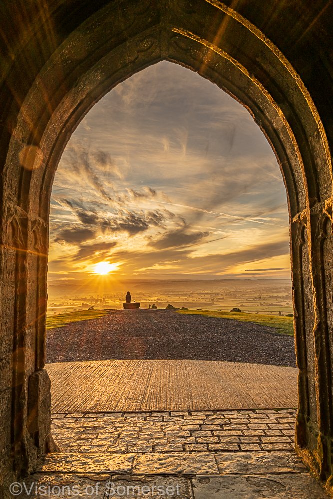 Glastomichelle's tweet photo. Archway sunrise from Glastonbury Tor. https://t.co/rUj1cuzJ97