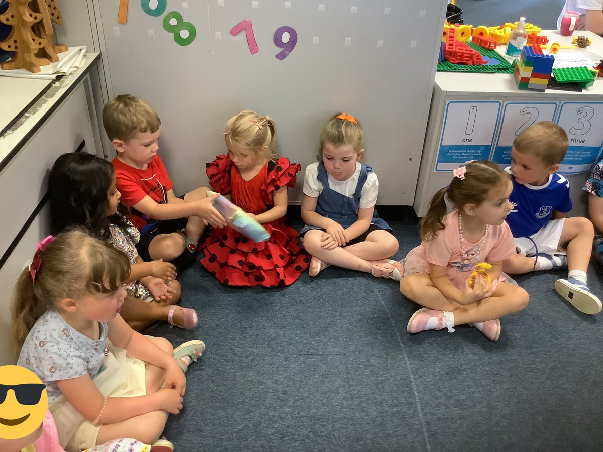 We’re having lots of fun playing ‘Pass the Parcel’.