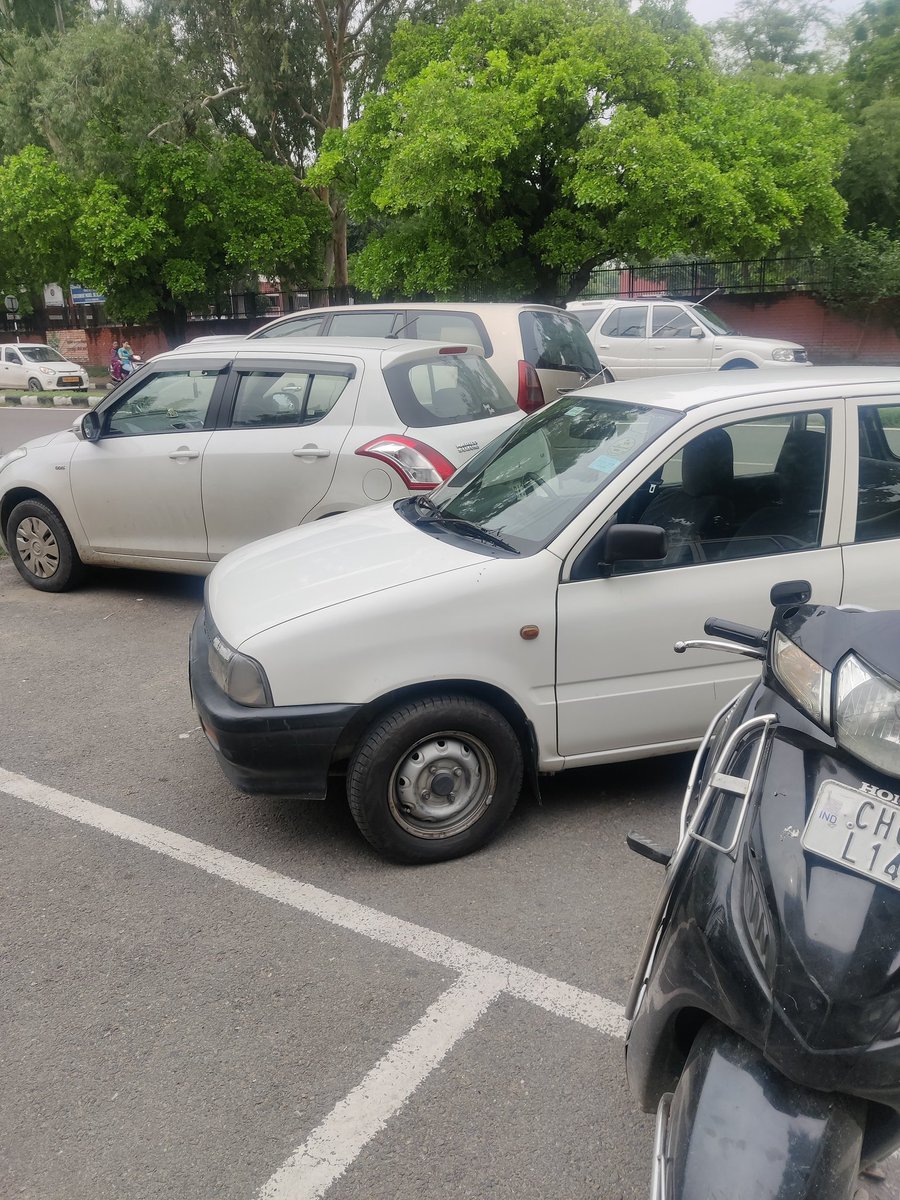 Riddziiee's tweet photo. @trafficchd Dear Chandigarh Police, a wrongly parked car ( opposite sector 21 market ) had blocked several other cars that were parked within the designated parking areas.
This person caused an hour's nuisance. 
Hope you take action ! https://t.co/BQL6uKkuAN