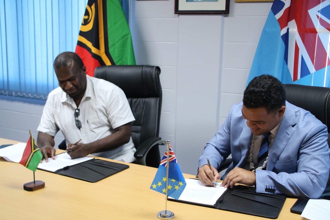 Simon_Kofe's tweet photo. Last year Vanuatu Foreign Minister Marc Ati and I signed an Air Service Agreement to allow air services between Port Vila and Funafuti. Today we signed off a Joint Communique formalising 🇹🇻 🇻🇺 diplomatic relations. Having studied in #Vanuatu many moons ago this was a special one. https://t.co/BYJSV5UujM