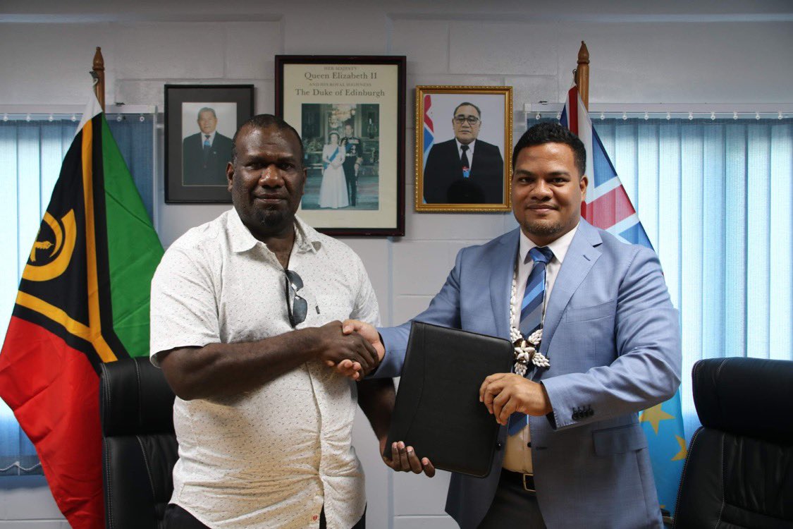 Simon_Kofe's tweet photo. Last year Vanuatu Foreign Minister Marc Ati and I signed an Air Service Agreement to allow air services between Port Vila and Funafuti. Today we signed off a Joint Communique formalising 🇹🇻 🇻🇺 diplomatic relations. Having studied in #Vanuatu many moons ago this was a special one. https://t.co/BYJSV5UujM
