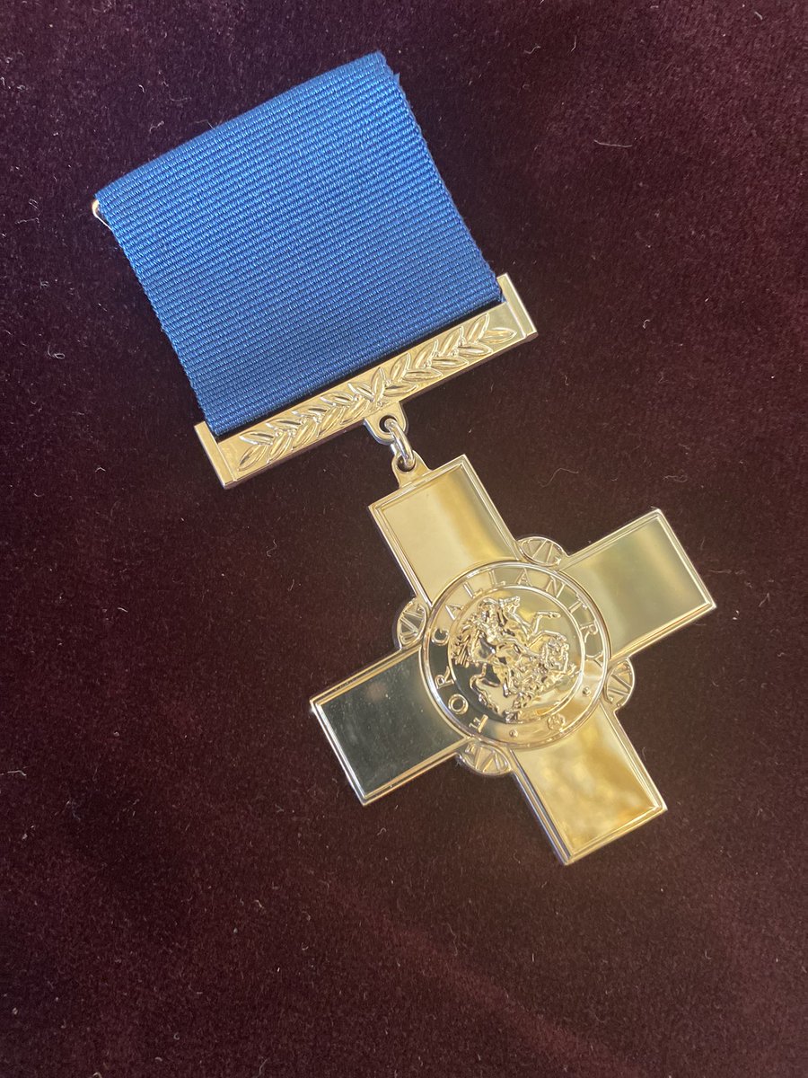 The Queen, accompanied by The Prince of Wales, has presented the George Cross to representatives of the National Health Service.