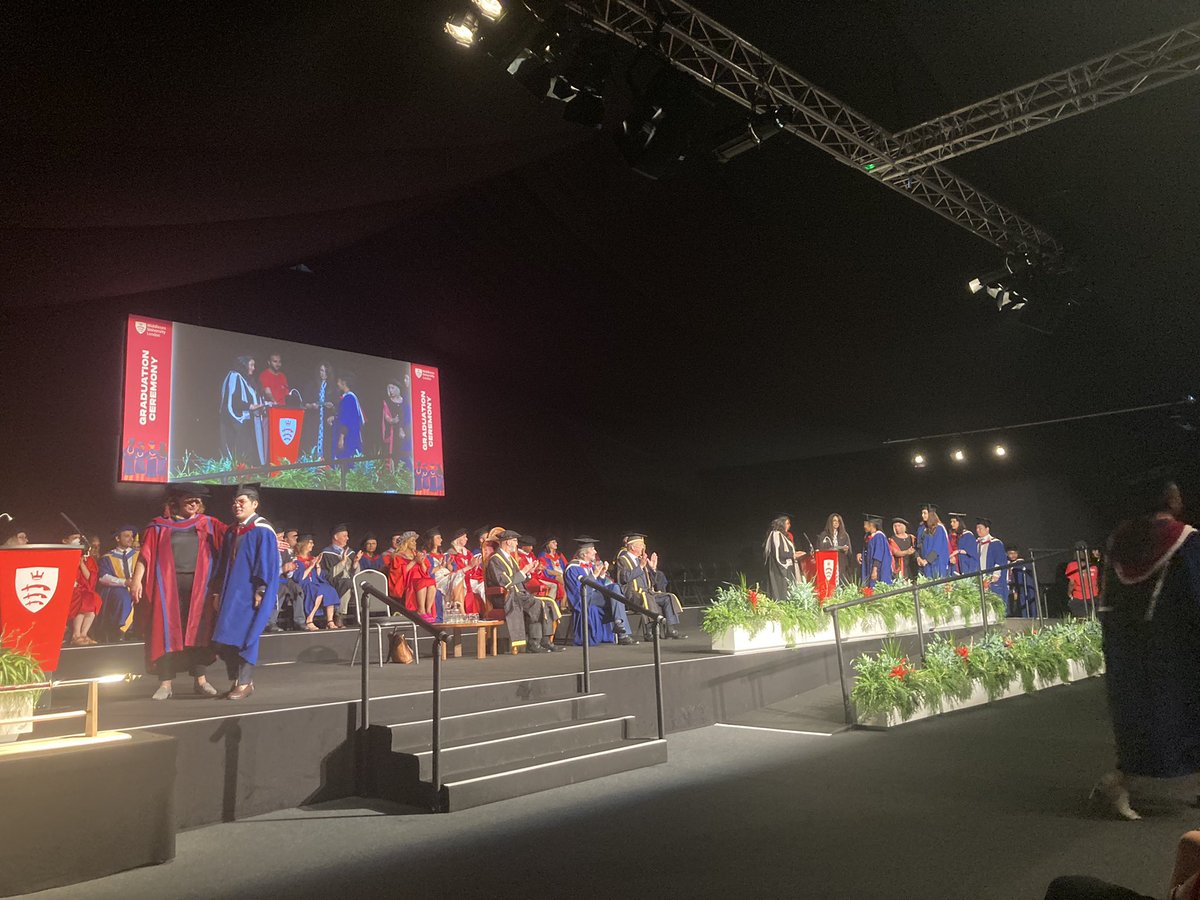 Our amazing academic staff members Dr Agnes Grondin &amp; Simon Roberts read out the names of our incredible graduates 🎓 at our <a href="/MDXbusiness/">MDX Business School</a> ceremony, with VC  <a href="/NicBeech1/">Nic Beech</a> &amp;Dean Fatima Annan-Diab congratulating everyone! Huge YAY, we are so excited &amp; proud!!! #TeamMDX #graduation2022