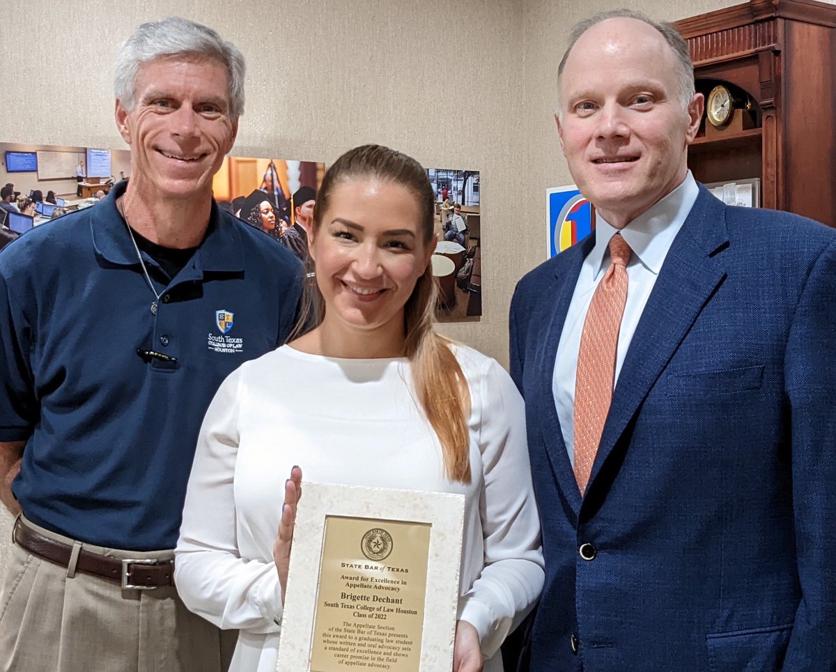 STCL_Houston's tweet photo. South Texas Law President and Dean Michael Barry and Vice President for Advocacy Rob Galloway recently presented alumna Brigette Dechant ’22 the prestigious State Bar of Texas Award for Excellence in Appellate Advocacy. #stclhouston #advocacy #stclalumni #lawschool https://t.co/o951Mppkib