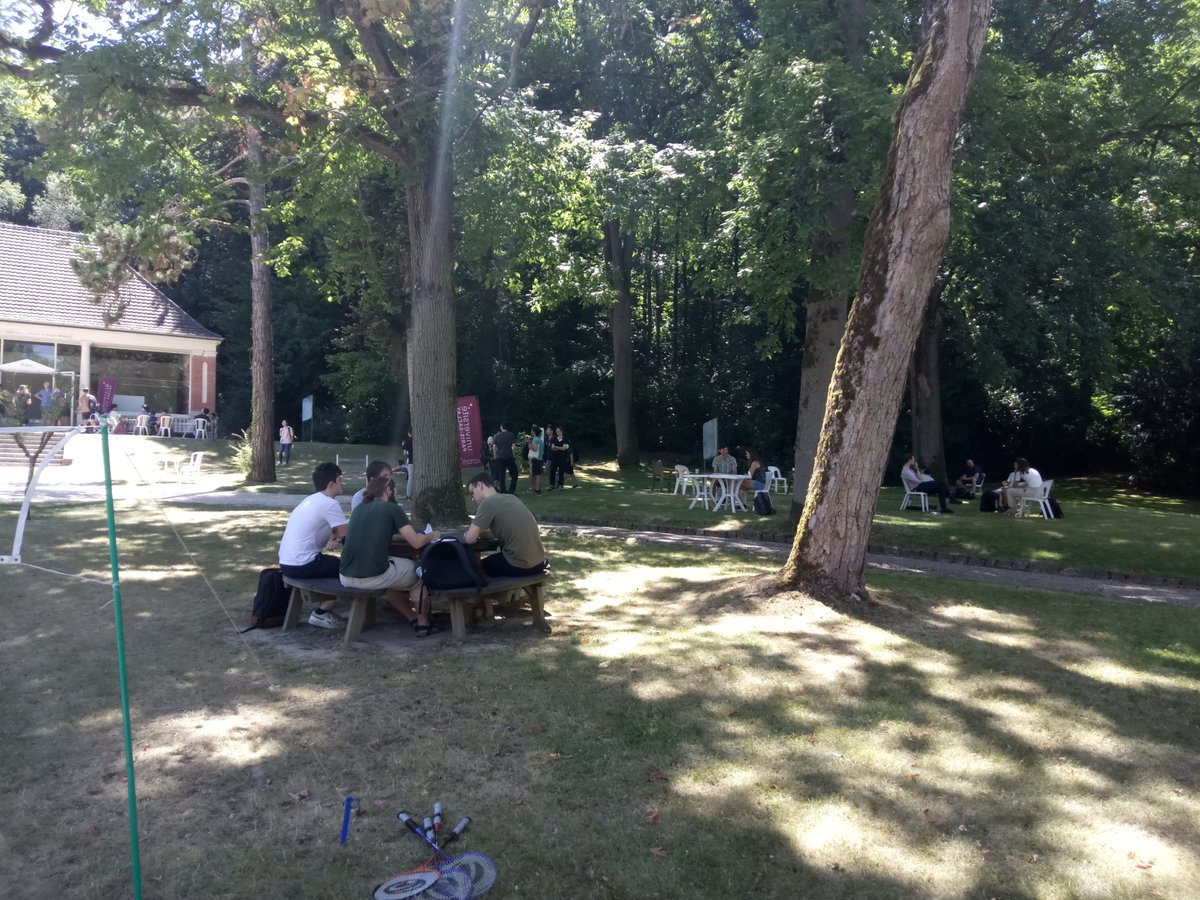 Institut_IHES's tweet photo. The #2022IHESSummerSchool on the #LanglandsProgram started yesterday, with the first lectures by Olivier Taïbi & Sophie Morel @ENSdeLyon, and Erez Lapid @WeizmannScience. If mornings & afternoons are dense with lectures, the park is the place to be on lunch breaks! https://t.co/JHxCrwS5Sk
