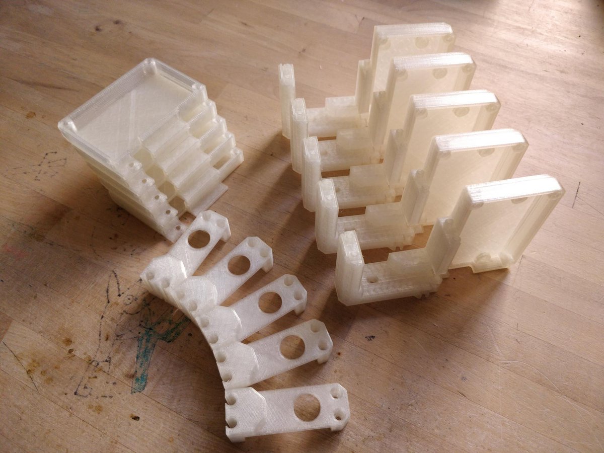 LabJetpack's tweet photo. flatcat assembly 🐛🔧 printing head pieces, final assembly step, home for an R0, one of the greatest computers ever made. Headway over cost. Next post more visual details.

#flatcat #socialrobot #opensource #robotics #startup #berlin #linux #cognition #embodiment #ai https://t.co/pmzUpK35Zf