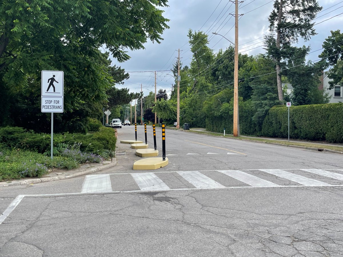 GuelphRSC's tweet photo. The City's first traffic calming curbs have been installed at Forest and Maple! These curbs narrow the road to help slow down traffic and improve road safety #GRSC #Guelph #RoadSafety https://t.co/DKSffnxpzf