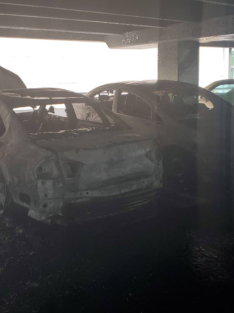 BaltCoFire's tweet photo. A total of 3 cars were destroyed after a fast spreading fire occurred on a 5th floor parking level of Towson Town Mall Tuesday morning. Hazmat crews assisted with a fuel spill caused by the fire. No injuries were reported and the cause of the fire is under investigation. TF https://t.co/ATAjkDluG5