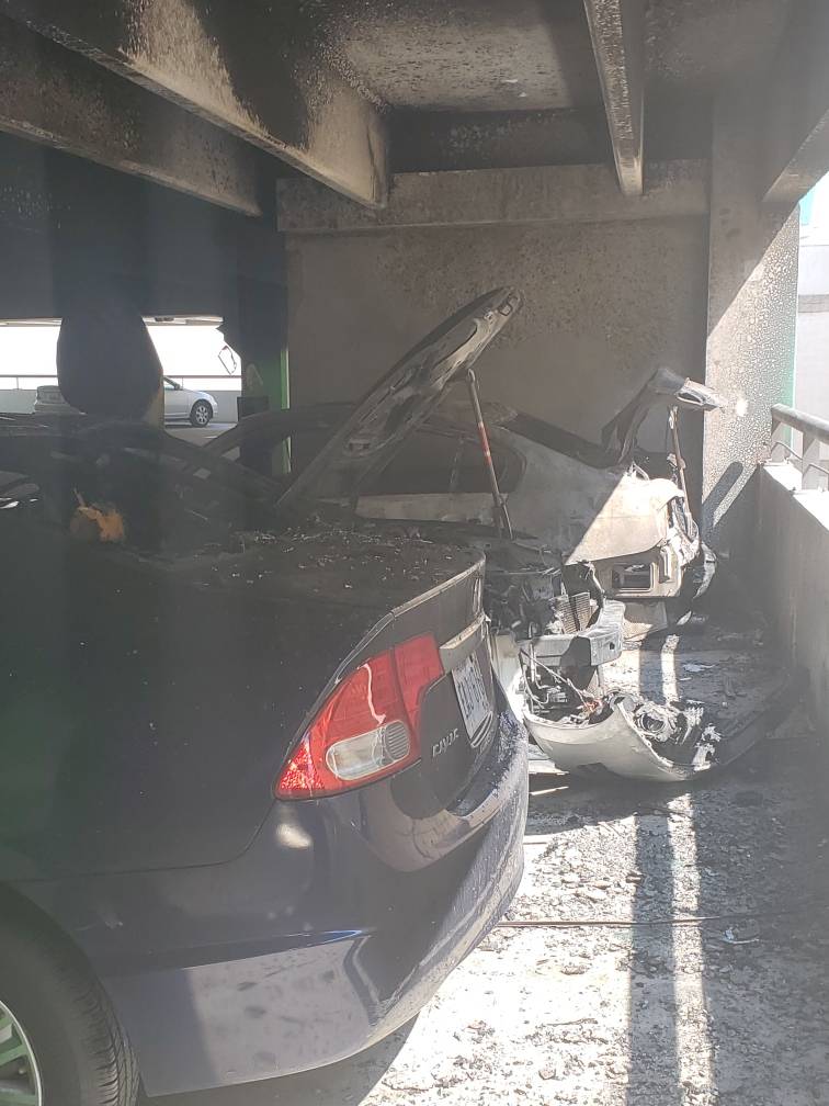 BaltCoFire's tweet photo. A total of 3 cars were destroyed after a fast spreading fire occurred on a 5th floor parking level of Towson Town Mall Tuesday morning. Hazmat crews assisted with a fuel spill caused by the fire. No injuries were reported and the cause of the fire is under investigation. TF https://t.co/ATAjkDluG5
