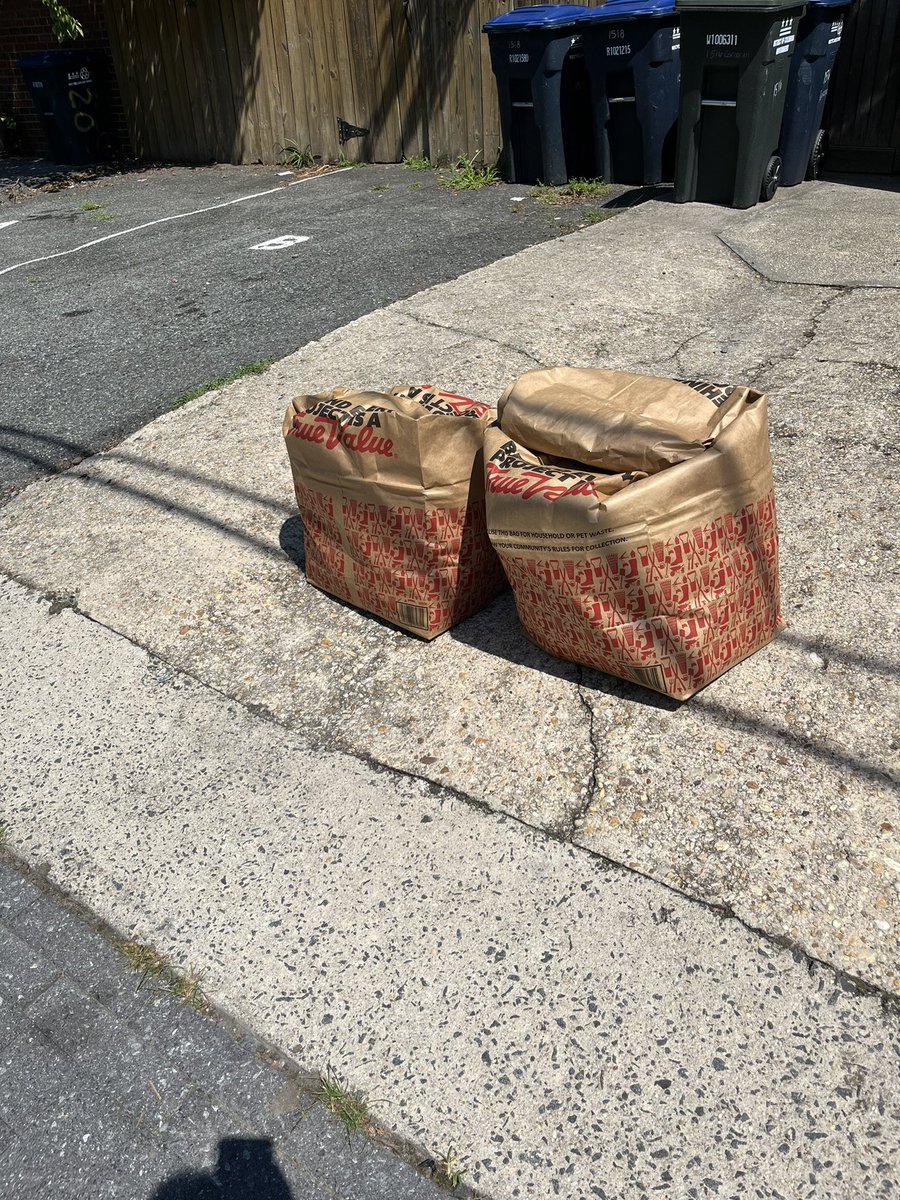 SVolman's tweet photo. @311DCgov our trash was picked up today as scheduled, but they did not take the yard waste bags at 1516 Corcoran or 1518. Would be great if they were collected before it rains later today. https://t.co/kkFtL3OQyX
