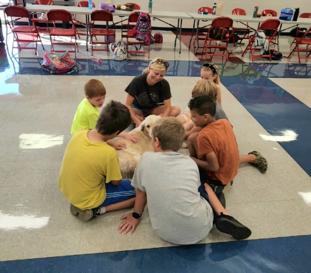 GoshenMH's tweet photo. It was a special morning welcoming Learning Academy students back to campus. The awesome LA staff welcomed us in, and thanks to Mrs. Walker, Mrs. Denu and their special service pups, we're another step closer to back to normal! @GoshenLocal @denulovesmath @KWalkerGMS https://t.co/2KzRhkLRvJ