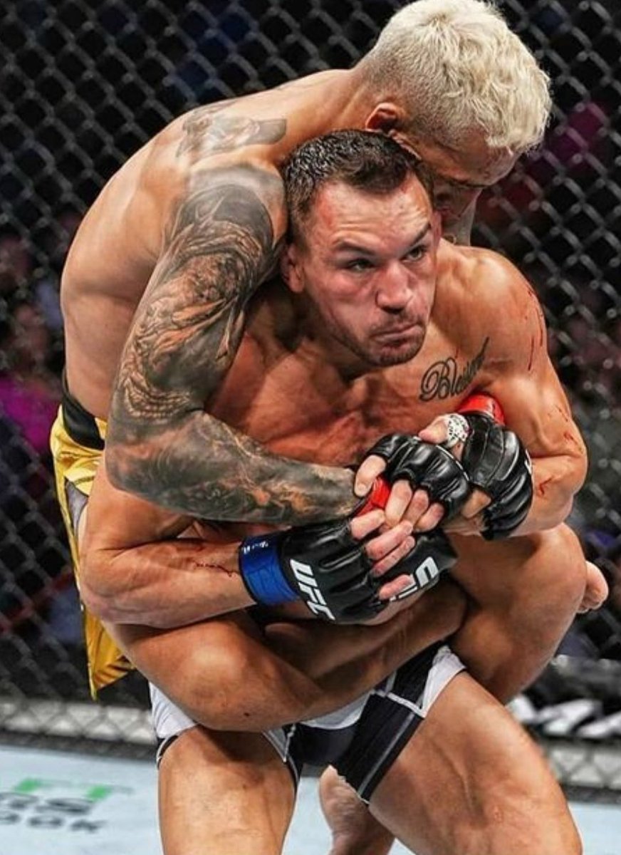 Michael Survived a 3rd degree black belt on his back with a tight body triangle. Impressive! 

Despite any losses Hes been an absolutly brilliant signing for the Ufc.