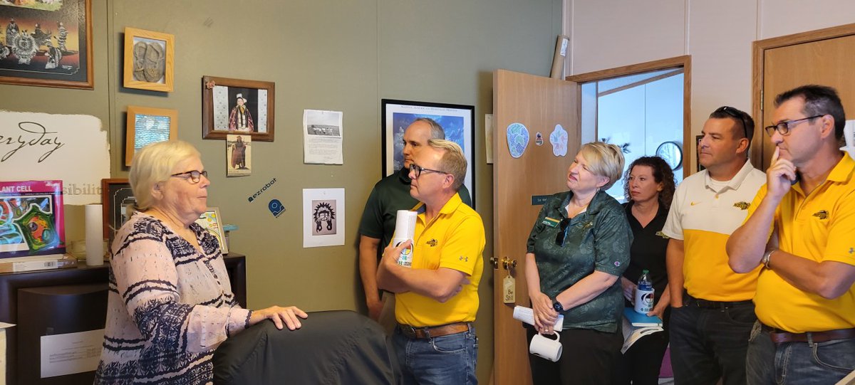 NDSU's tweet photo. NDSU leadership met with Sioux County Extension office staff and @SittingBullColl leadership today as part of the North Dakota tour. As part of his visit, @NDSUPresident Cook was gifted a traditional blanket from Sioux County Extension staff. https://t.co/gvcD150anR