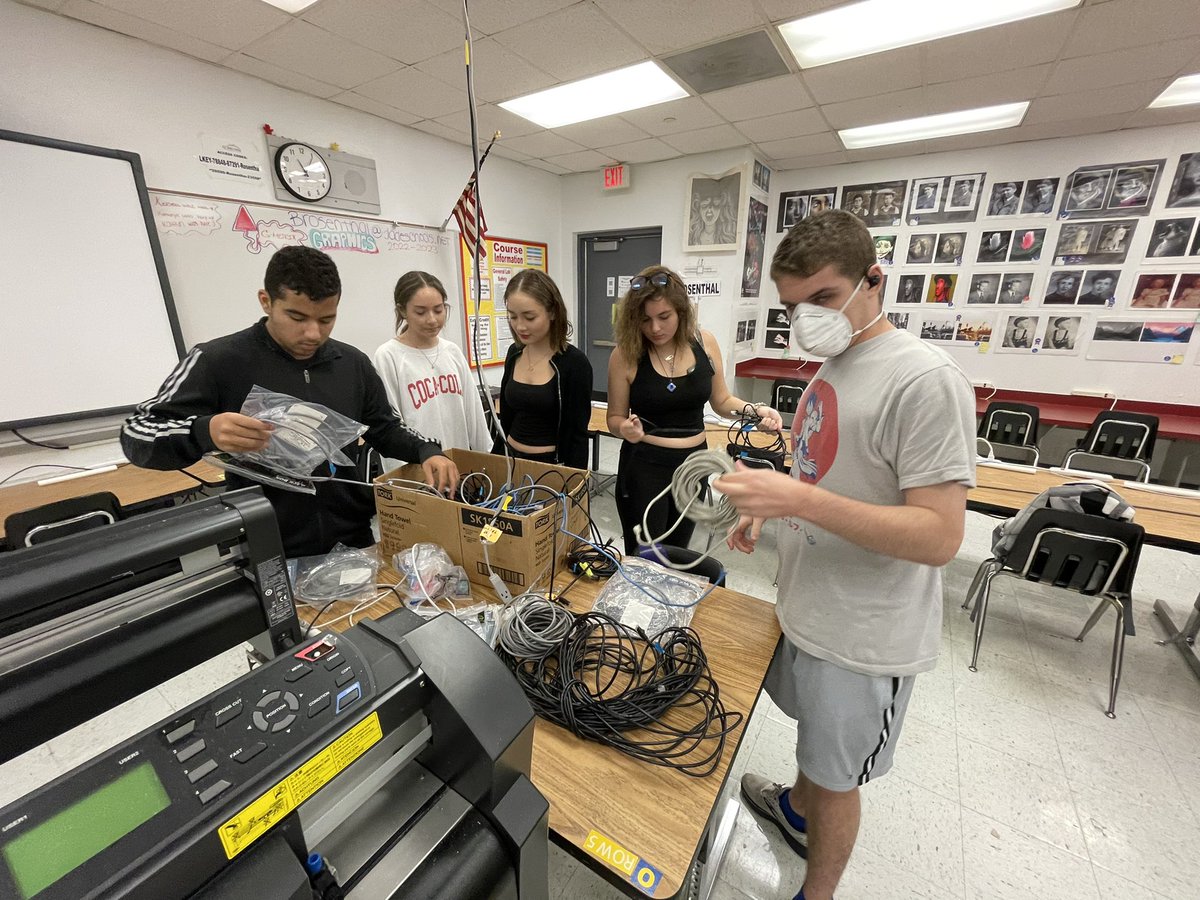 KropCTE's tweet photo. Week 2 with our #syip #interns - Mr. Rosenthal teaching the interns how to rewire and rebuild light tables. And the interns learned how to run new CAT 5e data cables in the CTE computer lab! #cteatwork #cte @CTEMiami @drldiaz @KrisUgarteTorre @KropSHS https://t.co/nvvefN7j9x