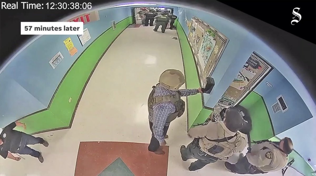 ATCSkyCat's tweet photo. @tplohetski Just standing around using hand sanitizer while children are massacred.  How does this keep getting worse? https://t.co/D1NKJWQbl4