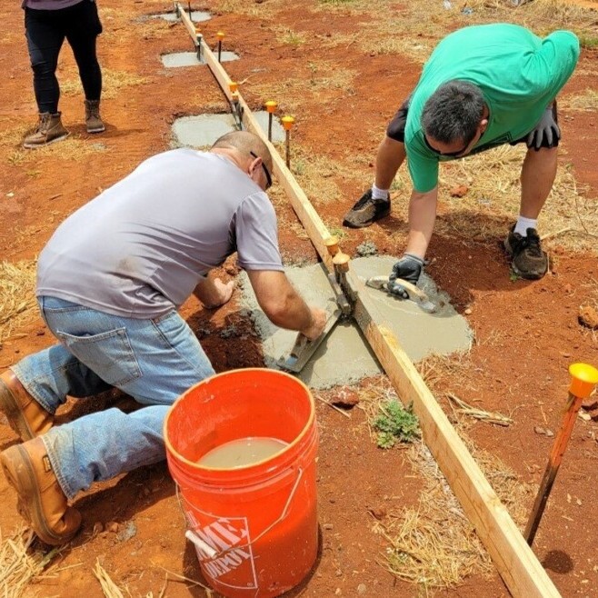 KauaiHabitat's tweet photo. Our Habitat homebuyers, volunteers, staff and AmeriCorps members have been busy pouring the footings for the final homes in our `Ele`ele Iluna subdivision! It's hard to believe that the subdivision is so close to completion! #homesandhope #eleeleiluna #buildaloha #kauai https://t.co/Vsqb0JENQT