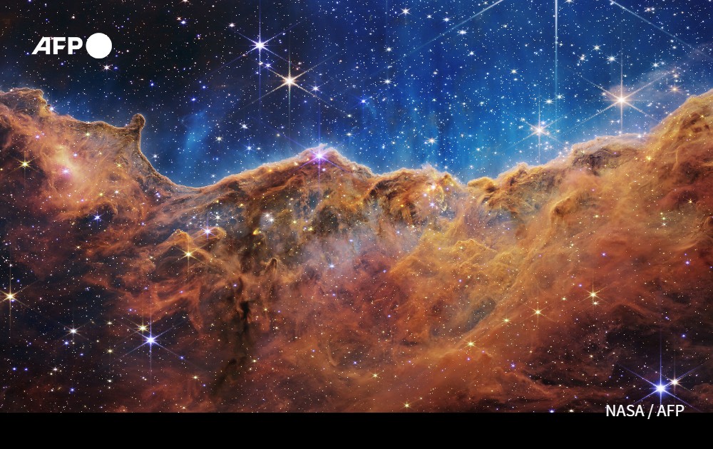 AFP's tweet photo. The cosmic cliffs of a stellar nursery and a quintet of galaxies bound in a celestial dance: NASA released the next wave of images from the James Webb Space Telescope, heralding a new era of astronomy https://t.co/JUrhHvEFgD

by @IssamAhmed https://t.co/PRyqhfewUt