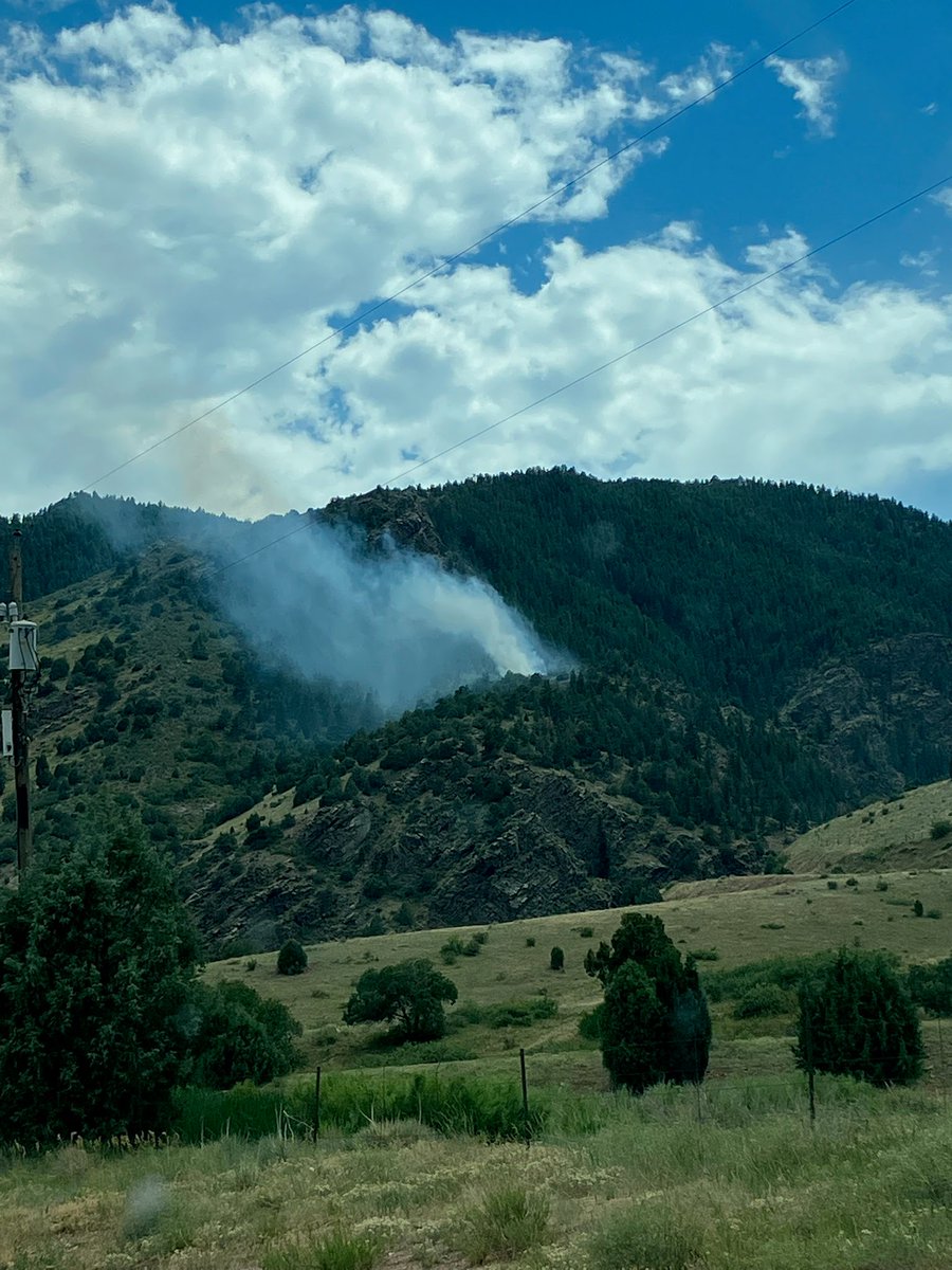 We're responding to a brush fire in area of Hwy 285 &amp; Hwy 8, near Mt. Lindo. Fire is on south side of highway and is spreading south. We're conducting door-to-door evacuations of homes in the area; no structures are immediately threatened. Initial info; more to come. PIO enroute.
