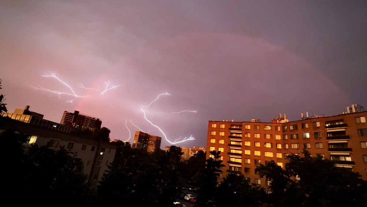 Rainbow and lightning over Downtown Silver Spring at 8:32pm <a href="/capitalweather/">Capital Weather Gang</a>