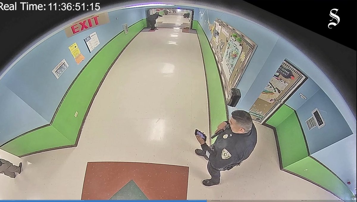 socialistdogmom's tweet image. they didn’t want us to see this guy using his service weapon as a stylus to flick past his punisher lock screen so he could check his texts to distract himself from the screams of dying children