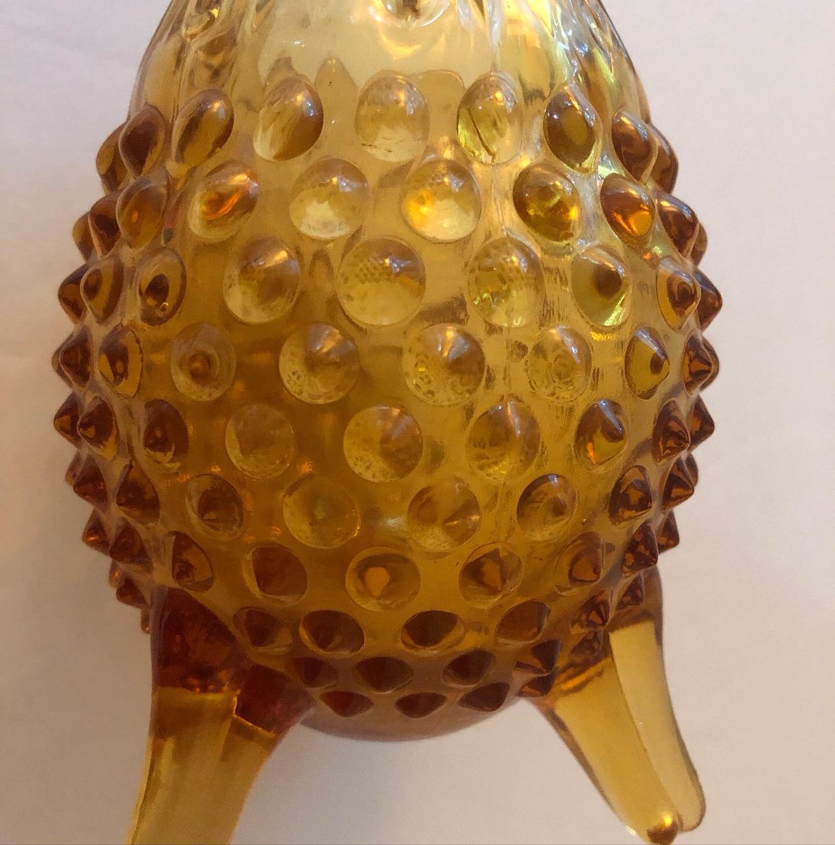 retromodstore's tweet photo. Vintage Fenton amber glass footed hobnail bud vase/candle holder. Price: $25 with free shipping. It’s a beautiful and unique piece in an egg shape, with a golden amber color &amp; beautiful hobnail detailing. #fenton #fentonglass #fentonhobnail #fentonamber #fentonamberglass https://t.co/k5PXK8MK0X